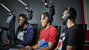 3_students_sound_booth_300x170