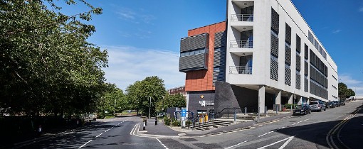 The MX Housman Building exterior, University of Wolverhampton branding on the front of the building