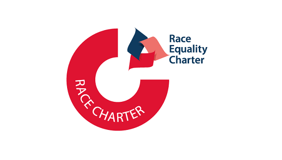 Logo for the Race Equality Charter, three coloured shapes forming a triangle at the edge of a red circle, text next to the shapes reading RACE EQUALITY CHARTER.