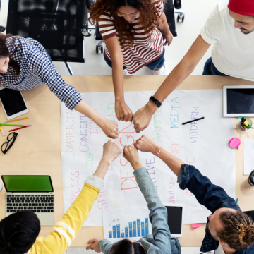 people with their hands together